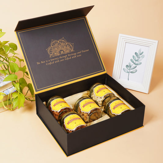 Decorative box with jars inside on a beige surface